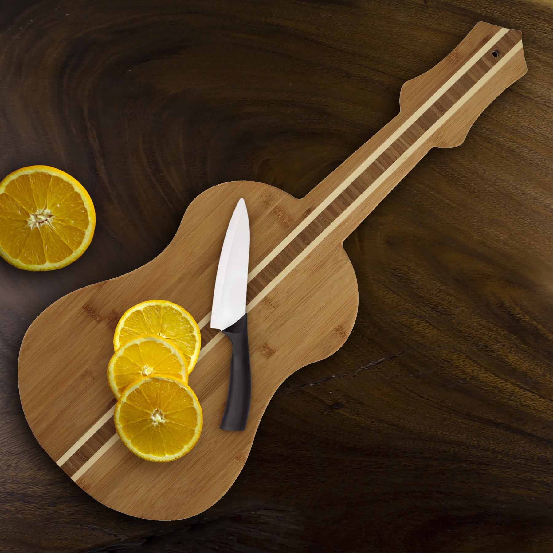 totally-bamboo-ukulele-shaped-cutting-board-22-x-9-bamboo-board image 2