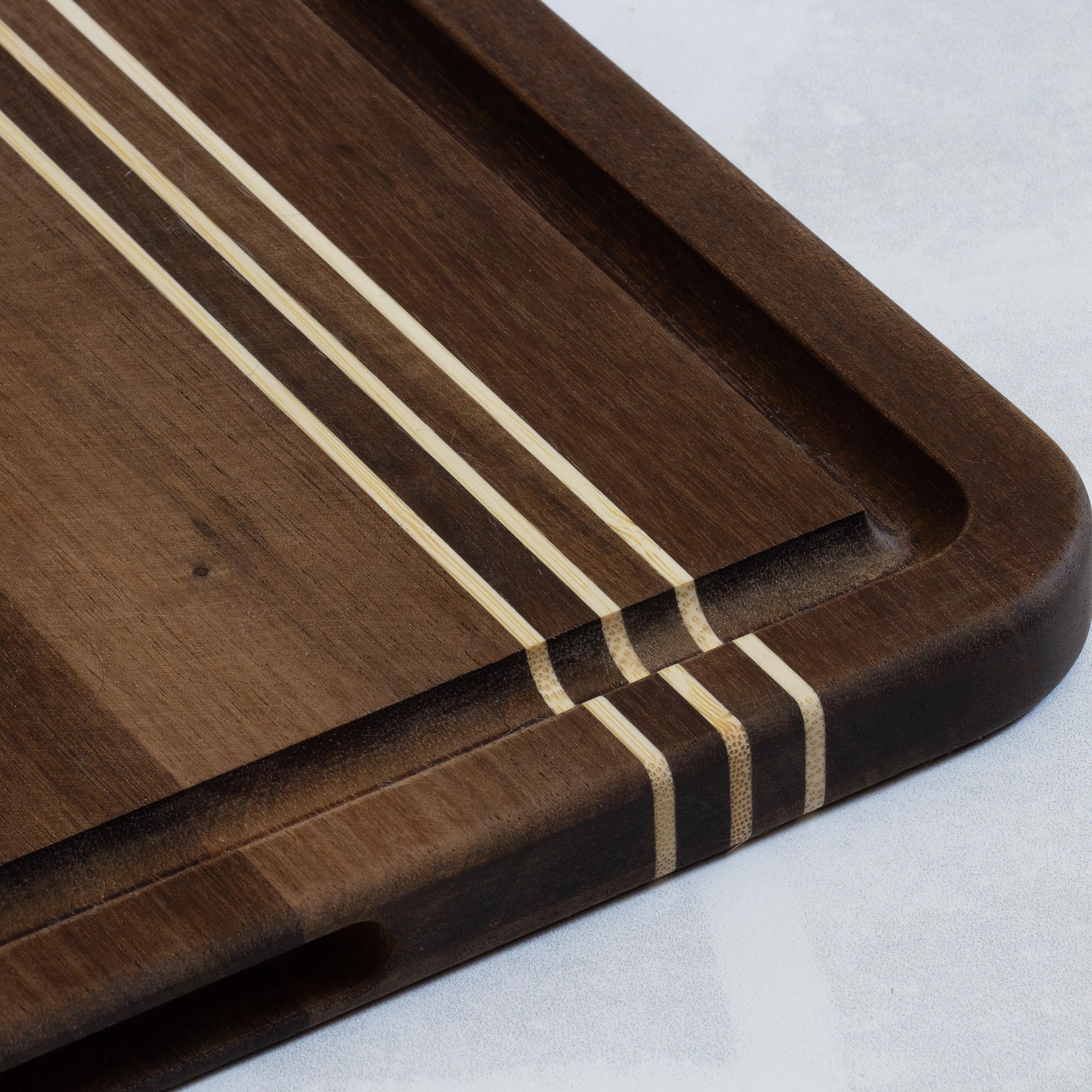 totally-bamboo-rock-branch-acacia-wood-pinstripe-cutting-board-18-1-8-x-12-1-8 image 3