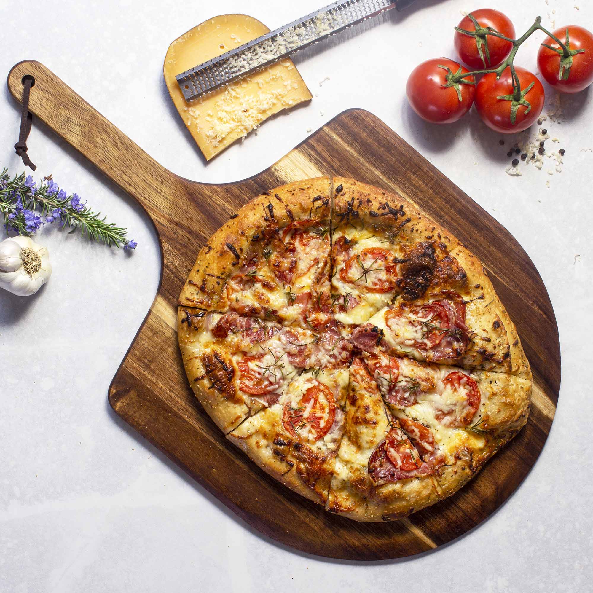 totally-bamboo-rock-branch-acacia-wood-pizza-peel-23-1-4-x-13-3-4-tapered-edge-f image 2