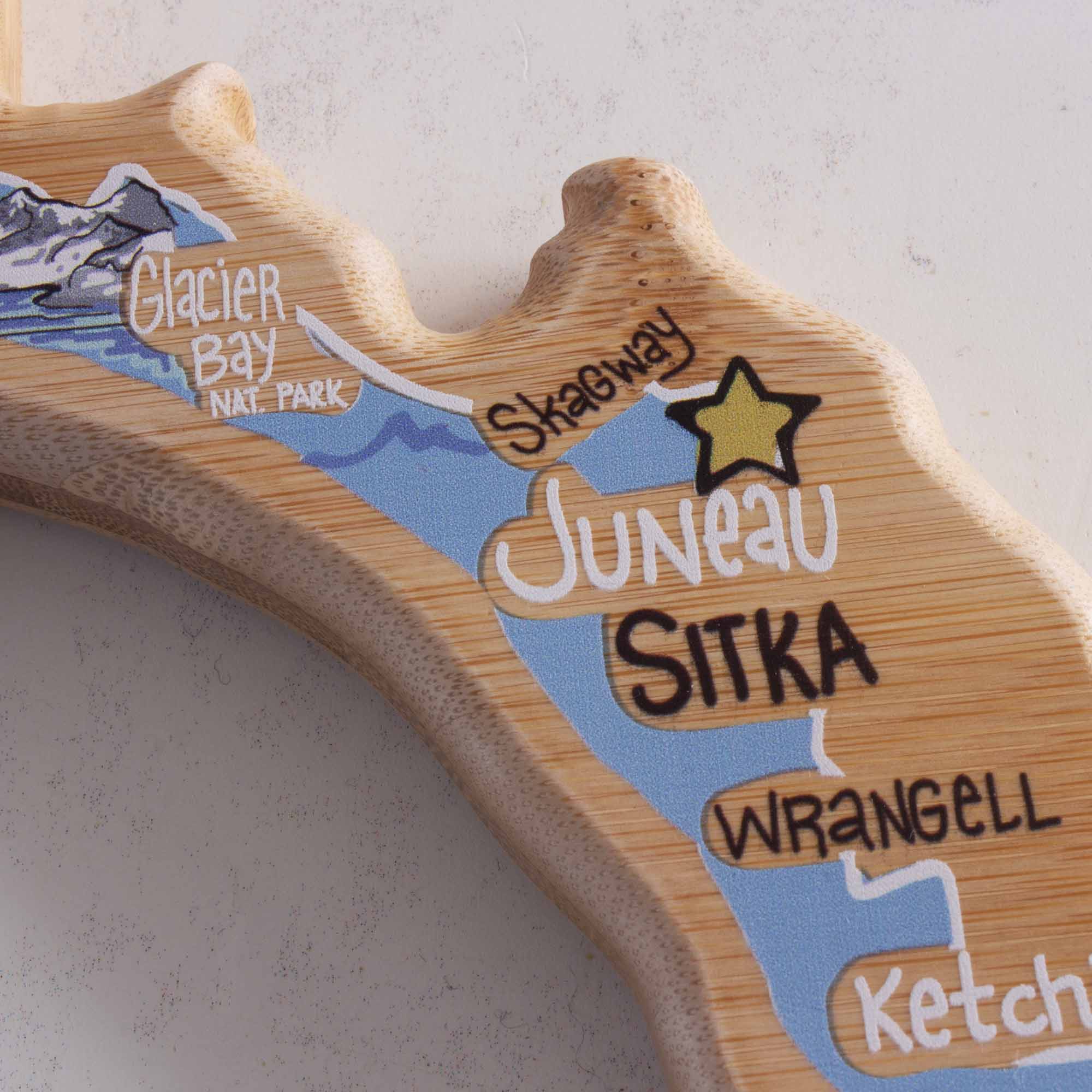 totally-bamboo-alaska-state-shaped-cutting-board-with-fish-kiss-artwork-by-anne- image 5