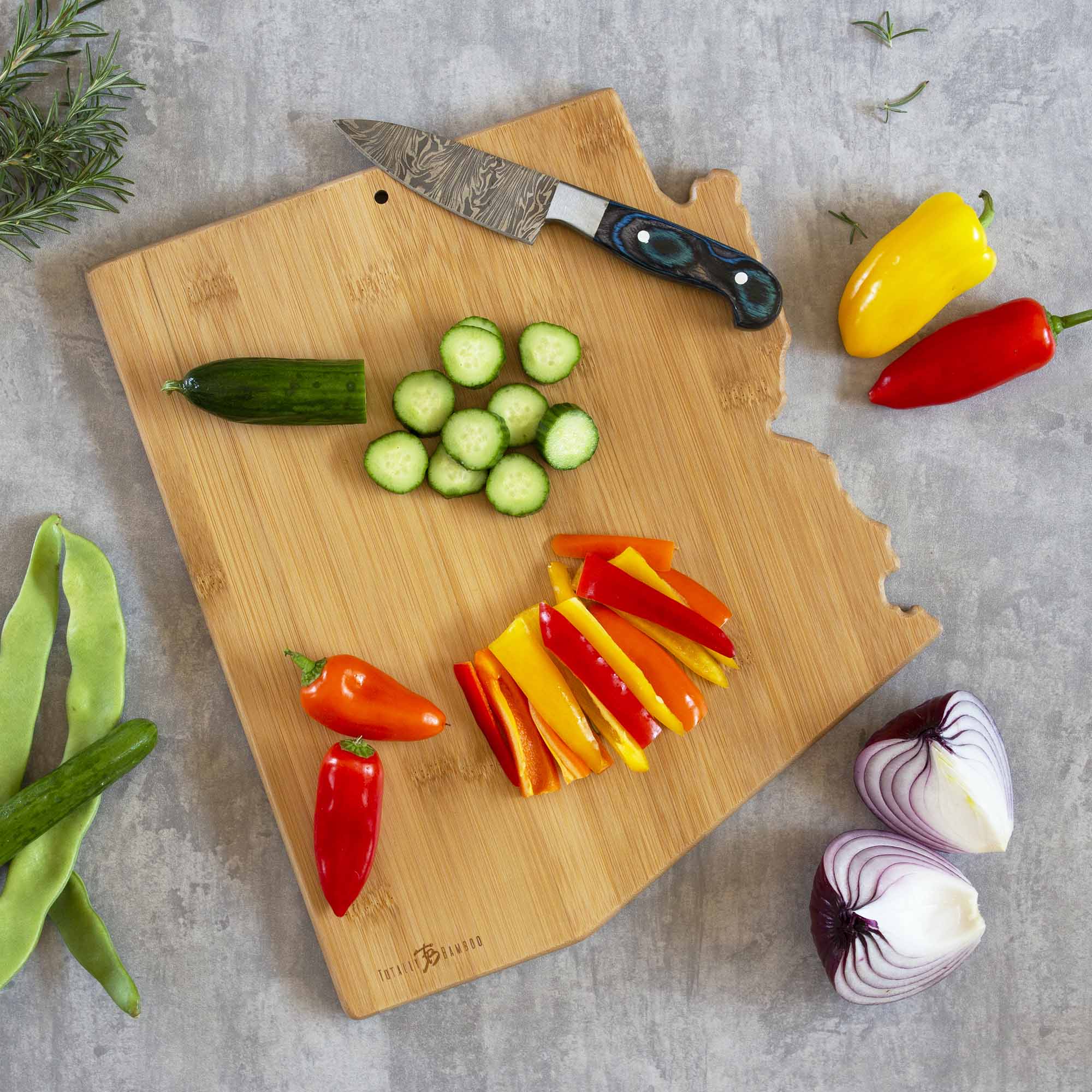 totally-bamboo-arizona-state-shaped-cutting-board-with-fish-kiss-artwork image 4