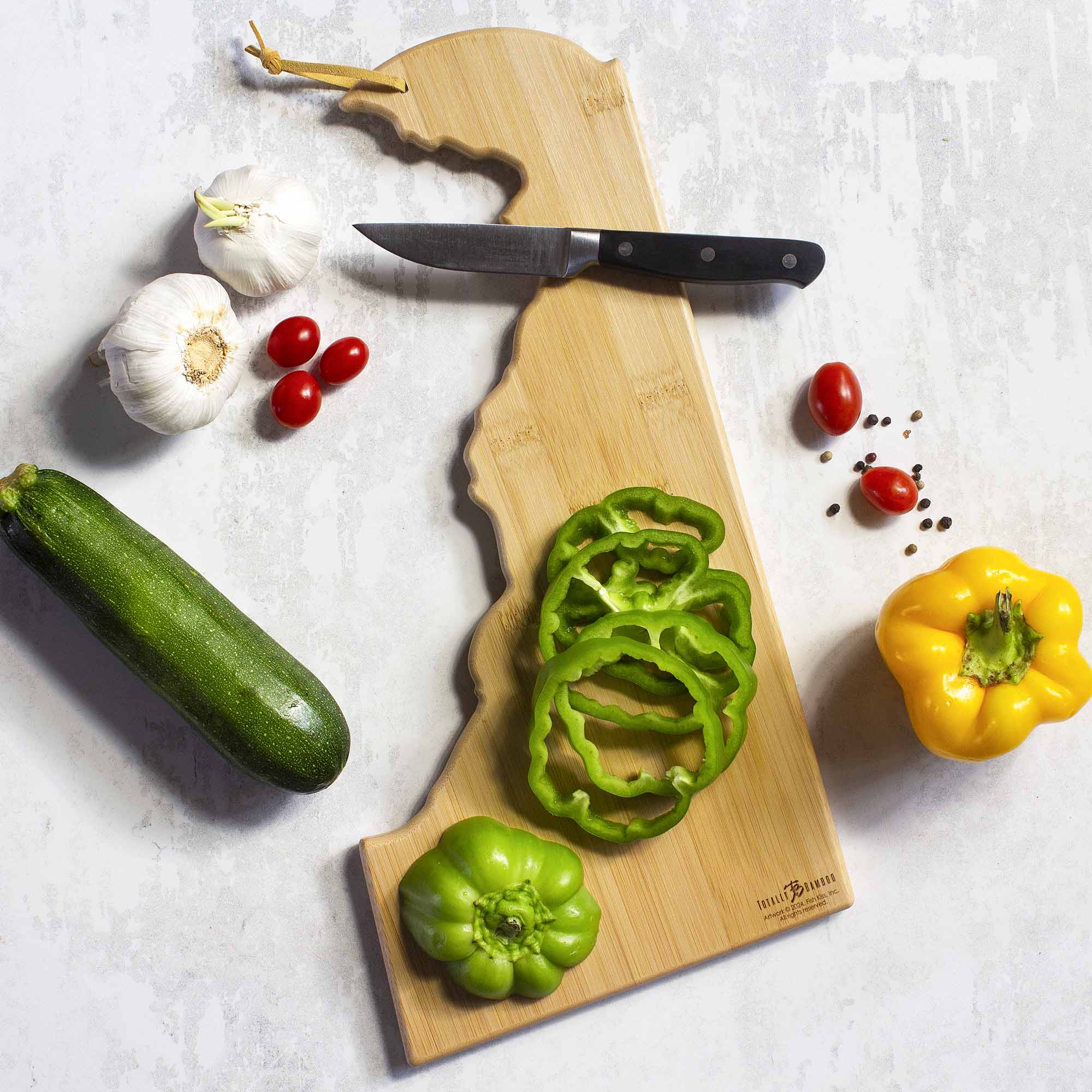 totally-bamboo-delaware-state-shaped-cutting-board-with-artwork-by-fish-kiss image 3