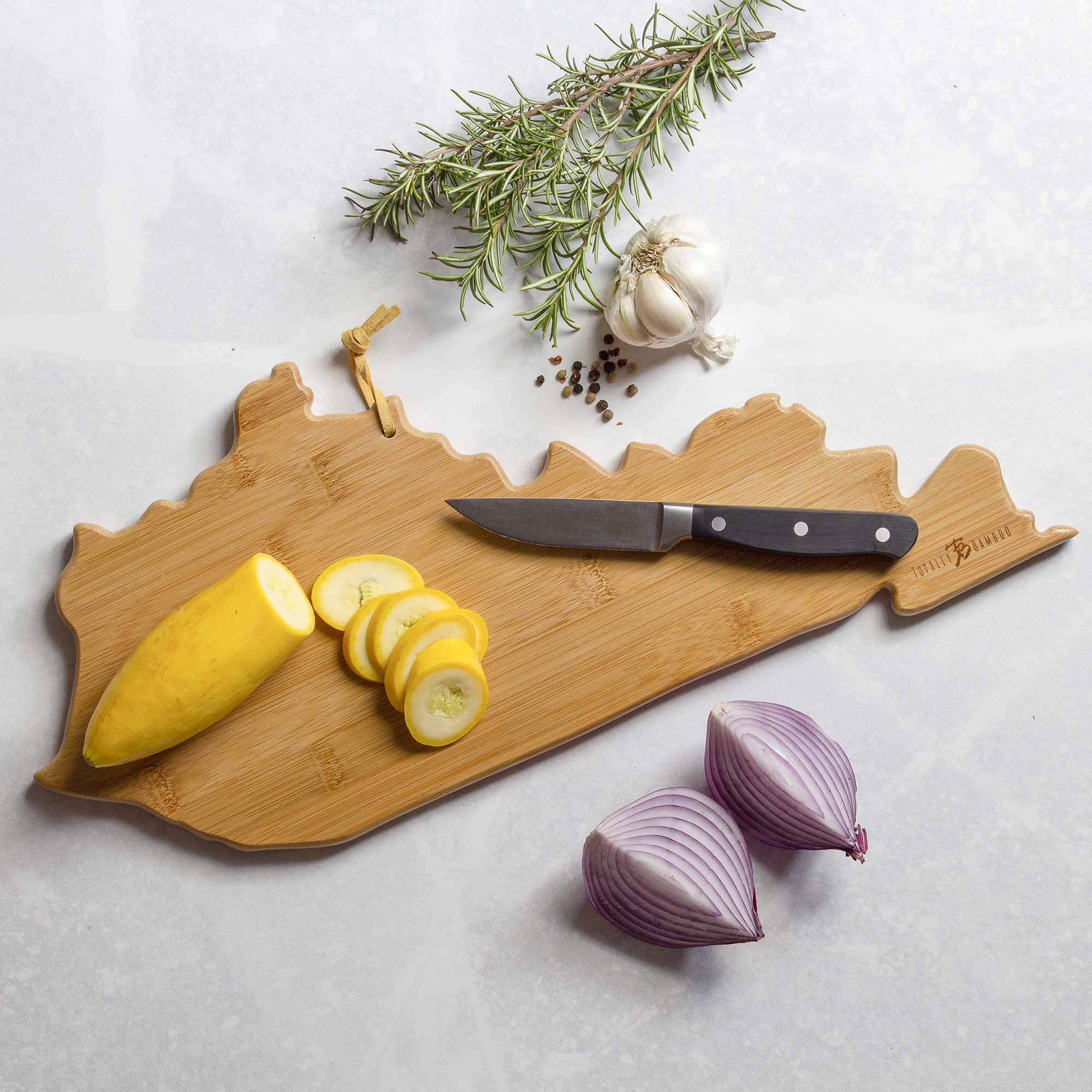totally-bamboo-kentucky-state-shaped-cutting-board-with-fish-kiss-artwork-by-ann image 4