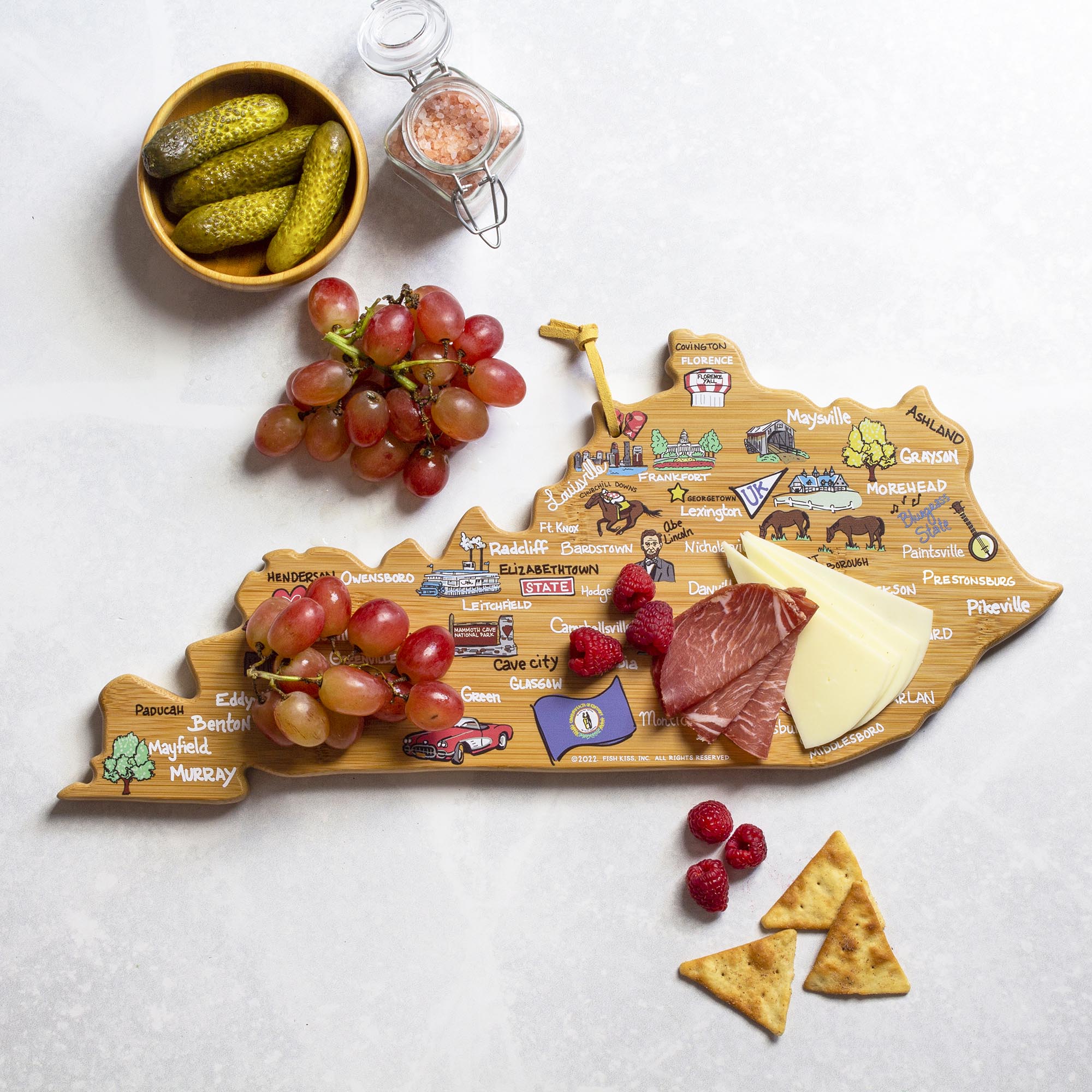 totally-bamboo-kentucky-state-shaped-cutting-board-with-fish-kiss-artwork-by-ann image 2