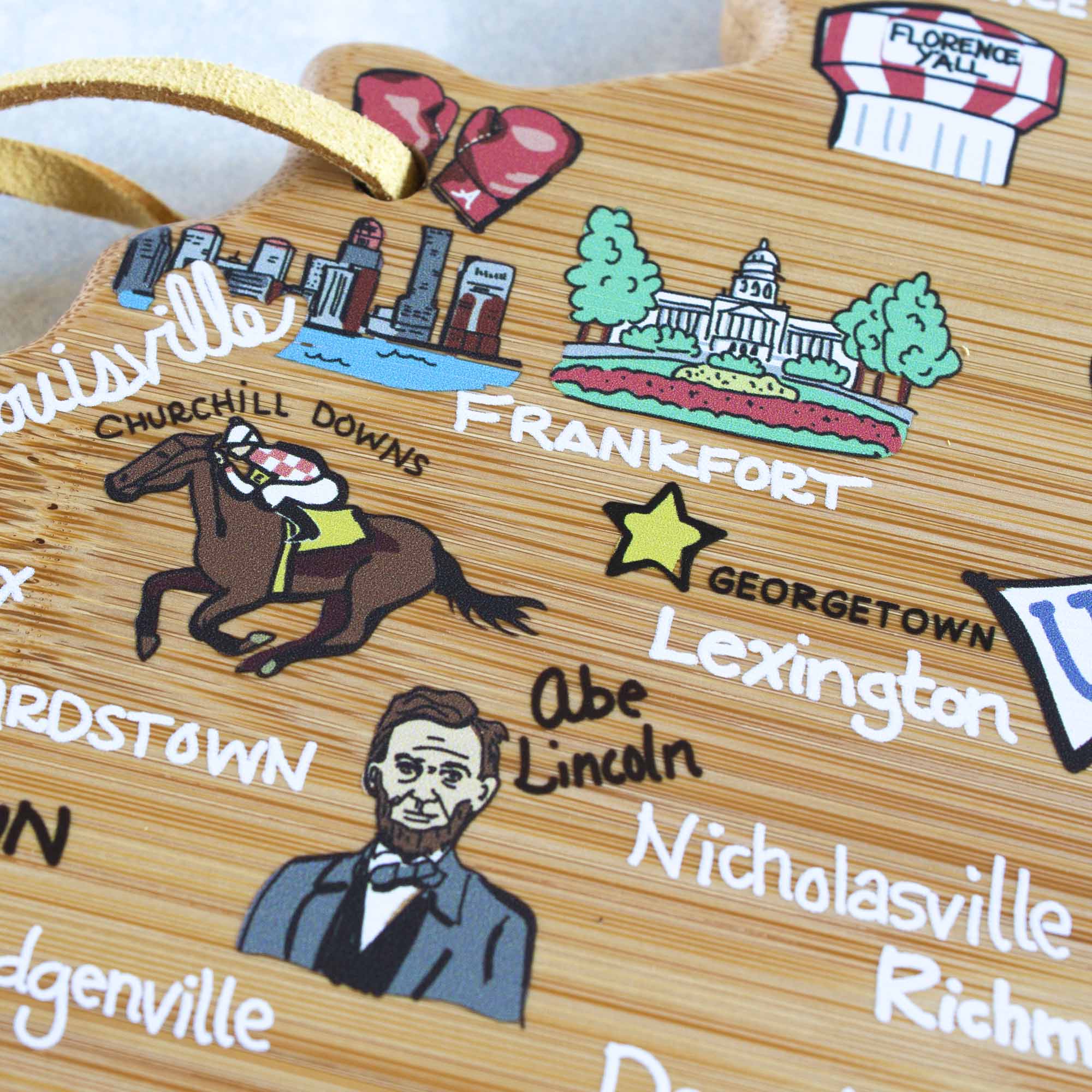 totally-bamboo-kentucky-state-shaped-cutting-board-with-fish-kiss-artwork-by-ann image 6