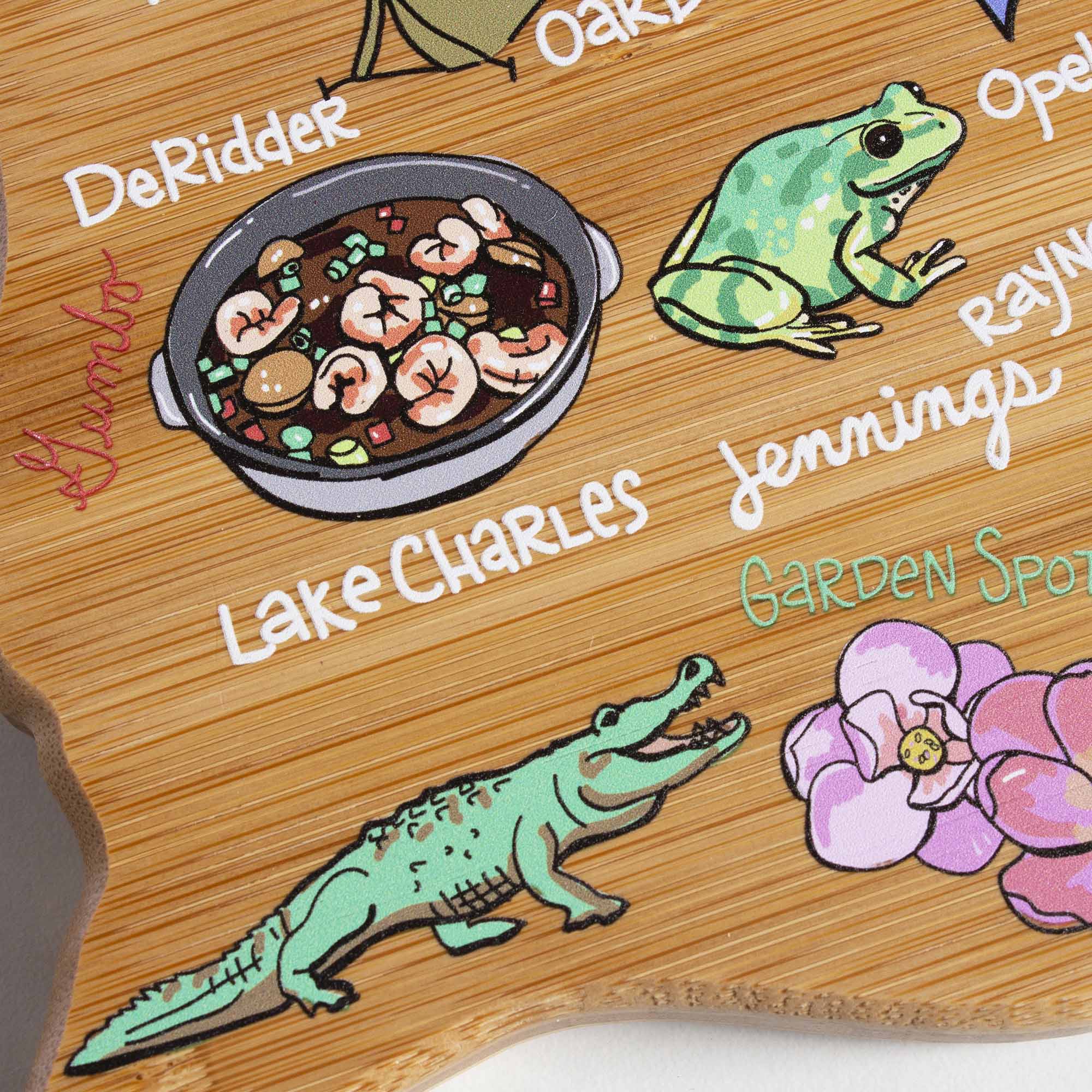 totally-bamboo-louisiana-state-shaped-cutting-board-with-fish-kiss-artwork-by-an image 6