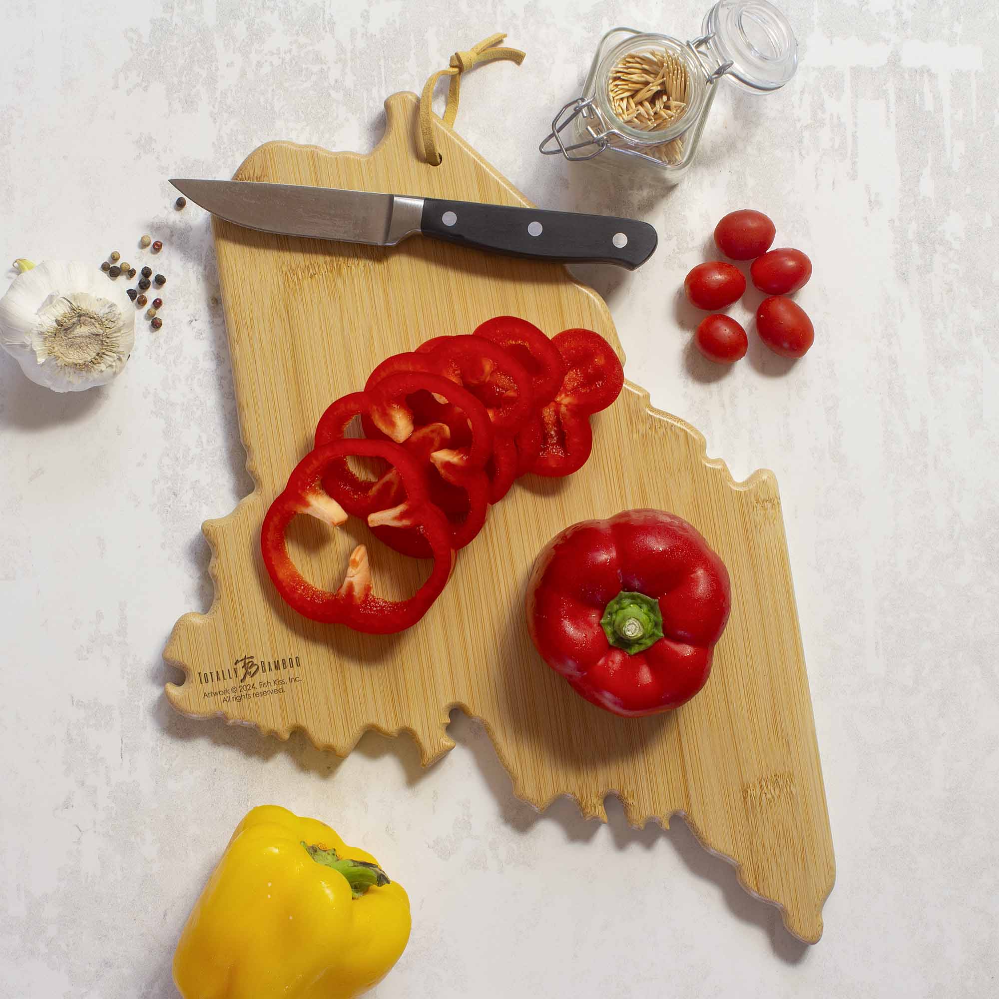 totally-bamboo-maine-state-shaped-cutting-board-with-fish-kiss-artwork-by-anne-k image 5