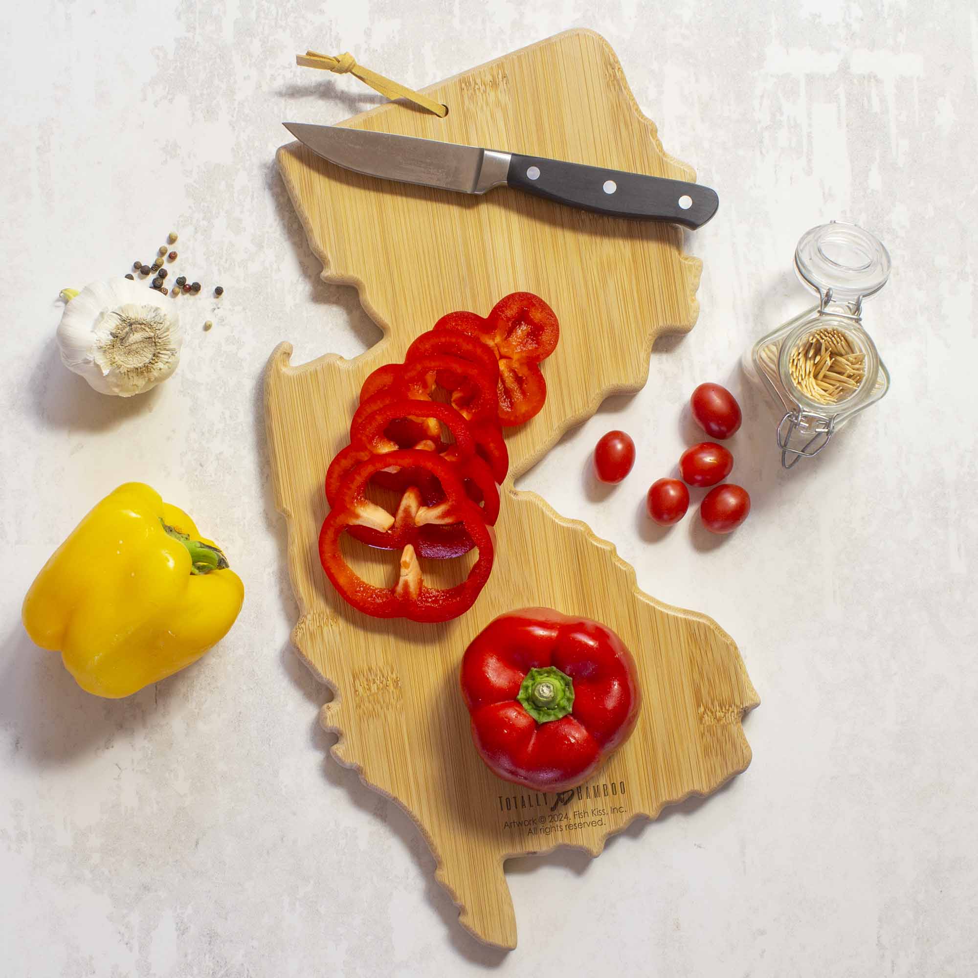 totally-bamboo-new-jersey-state-shaped-cutting-board-with-fish-kiss-artwork-by-a image 3