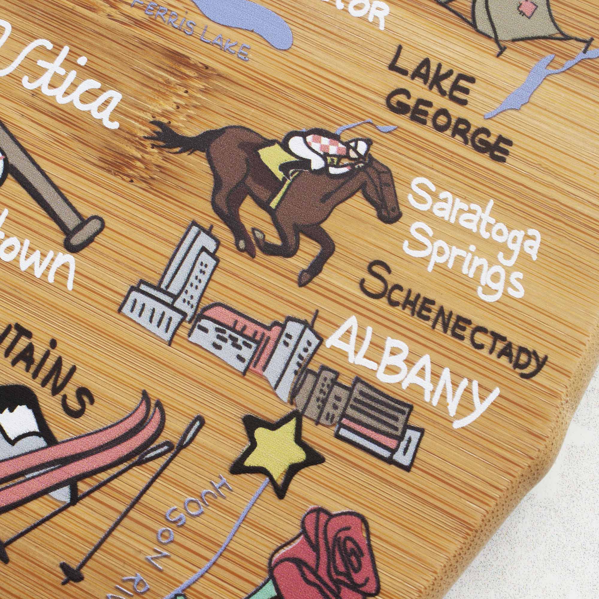 totally-bamboo-new-york-cutting-board-with-fish-kiss-artwork-state-shaped-bamboo image 5