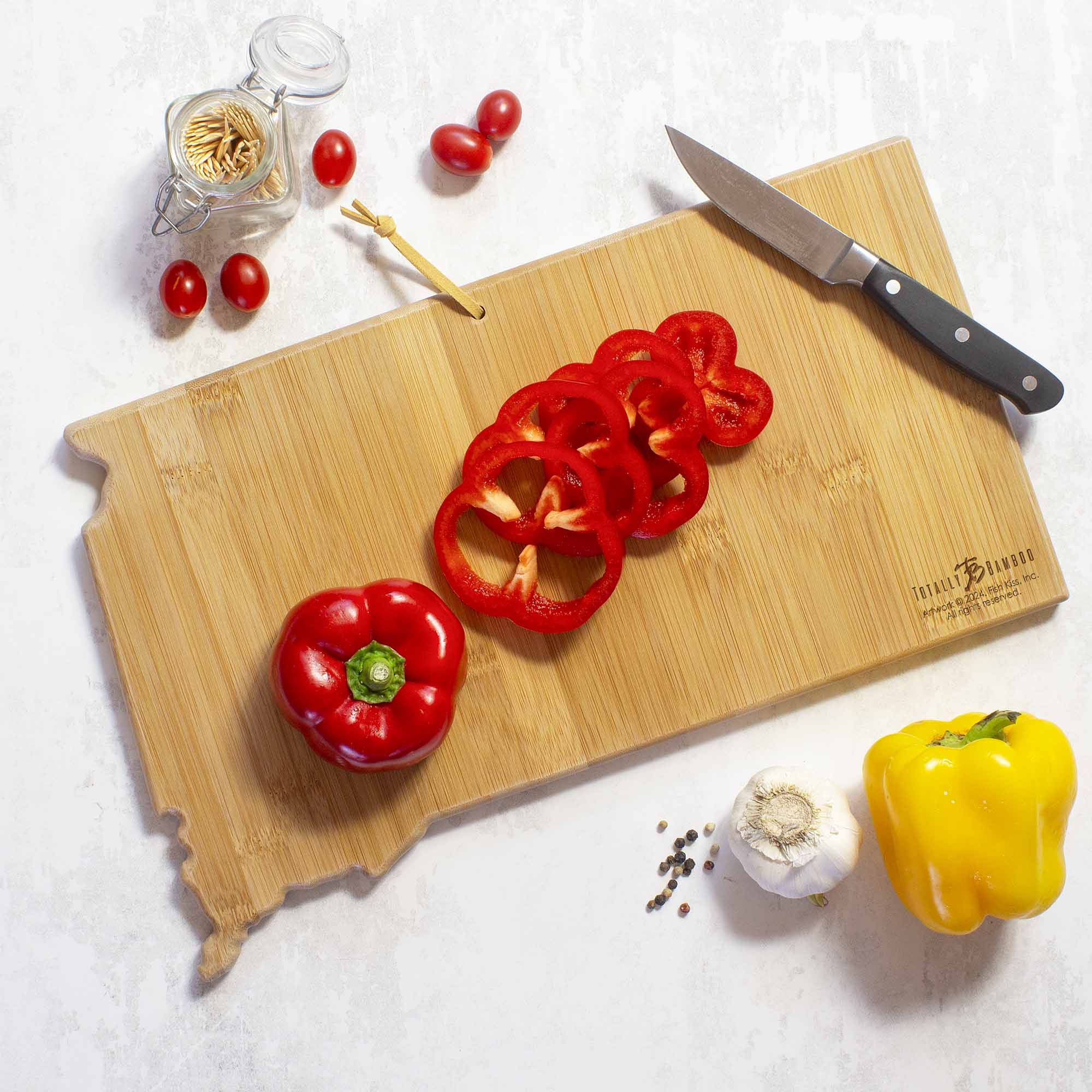 totally-bamboo-south-dakota-state-shaped-bamboo-cutting-serving-board-with-fish- image 3