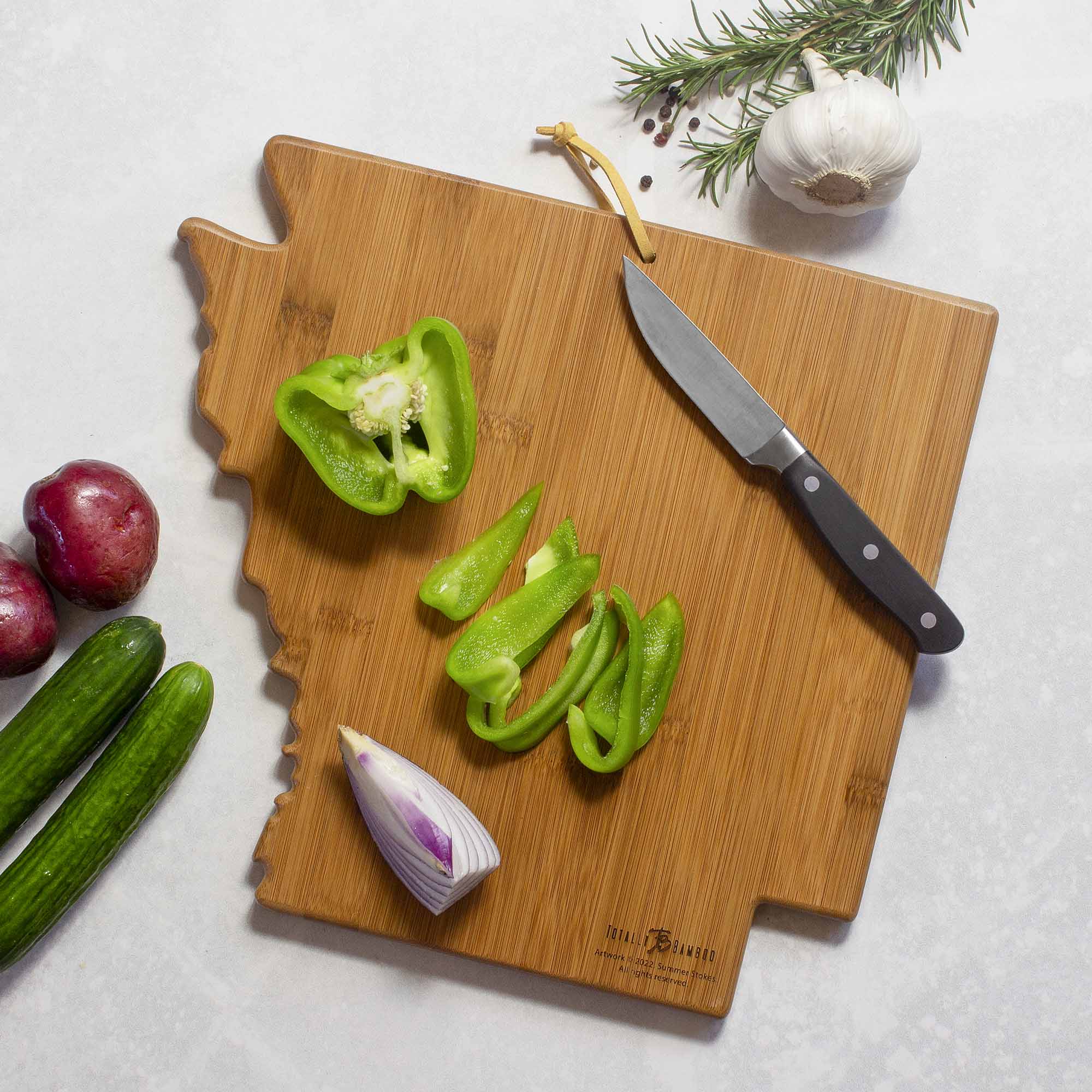 totally-bamboo-arkansas-state-shaped-cutting-board-with-artwork-by-summer-stokes image 3