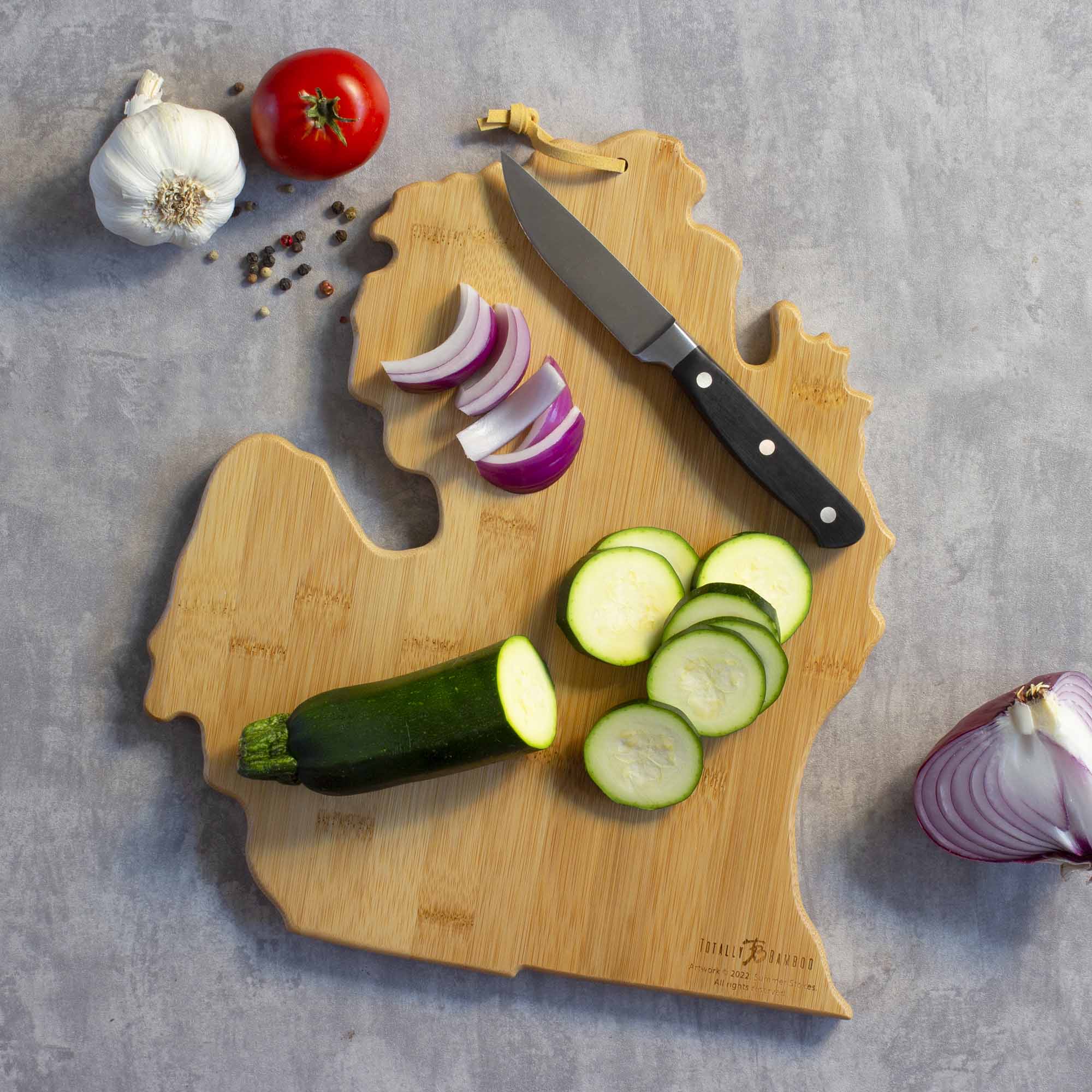 totally-bamboo-michigan-mitten-cutting-board-with-artwork-by-summer-stokes image 4