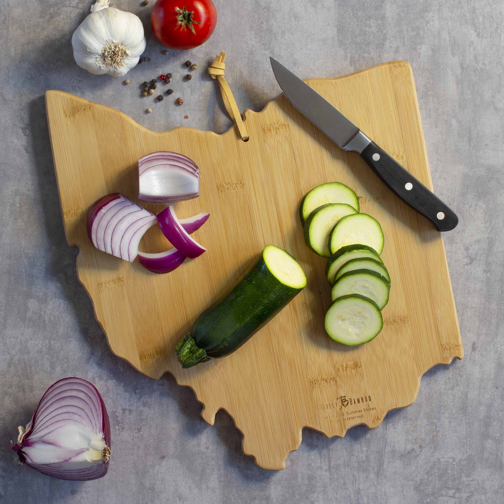 totally-bamboo-ohio-state-shaped-cutting-board-with-artwork-by-summer-stokes-bam image 4