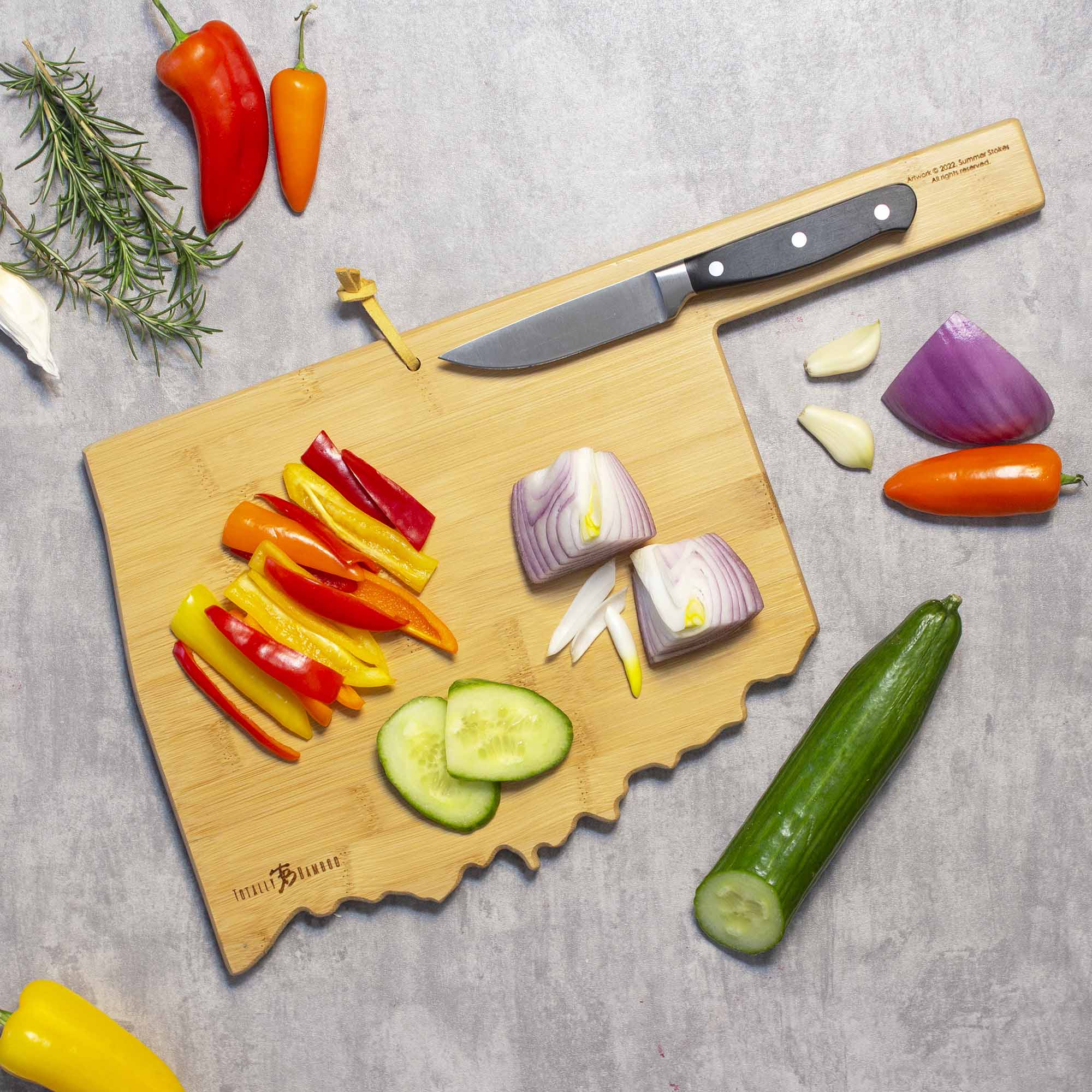 totally-bamboo-oklahoma-state-shaped-cutting-board-with-artwork-by-summer-stokes image 3