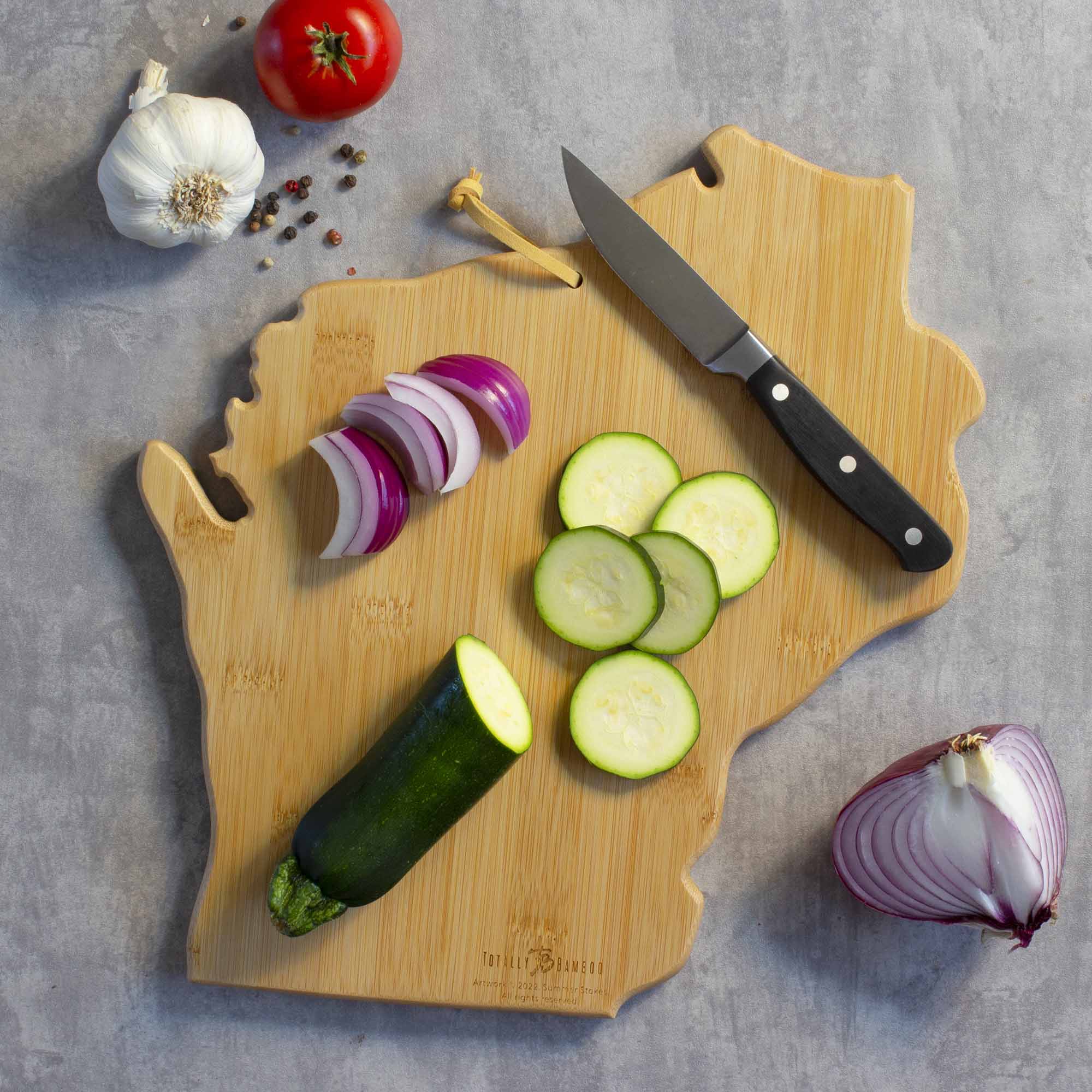totally-bamboo-wisconsin-cutting-board-with-artwork-by-summer-stokes-state-shape image 4