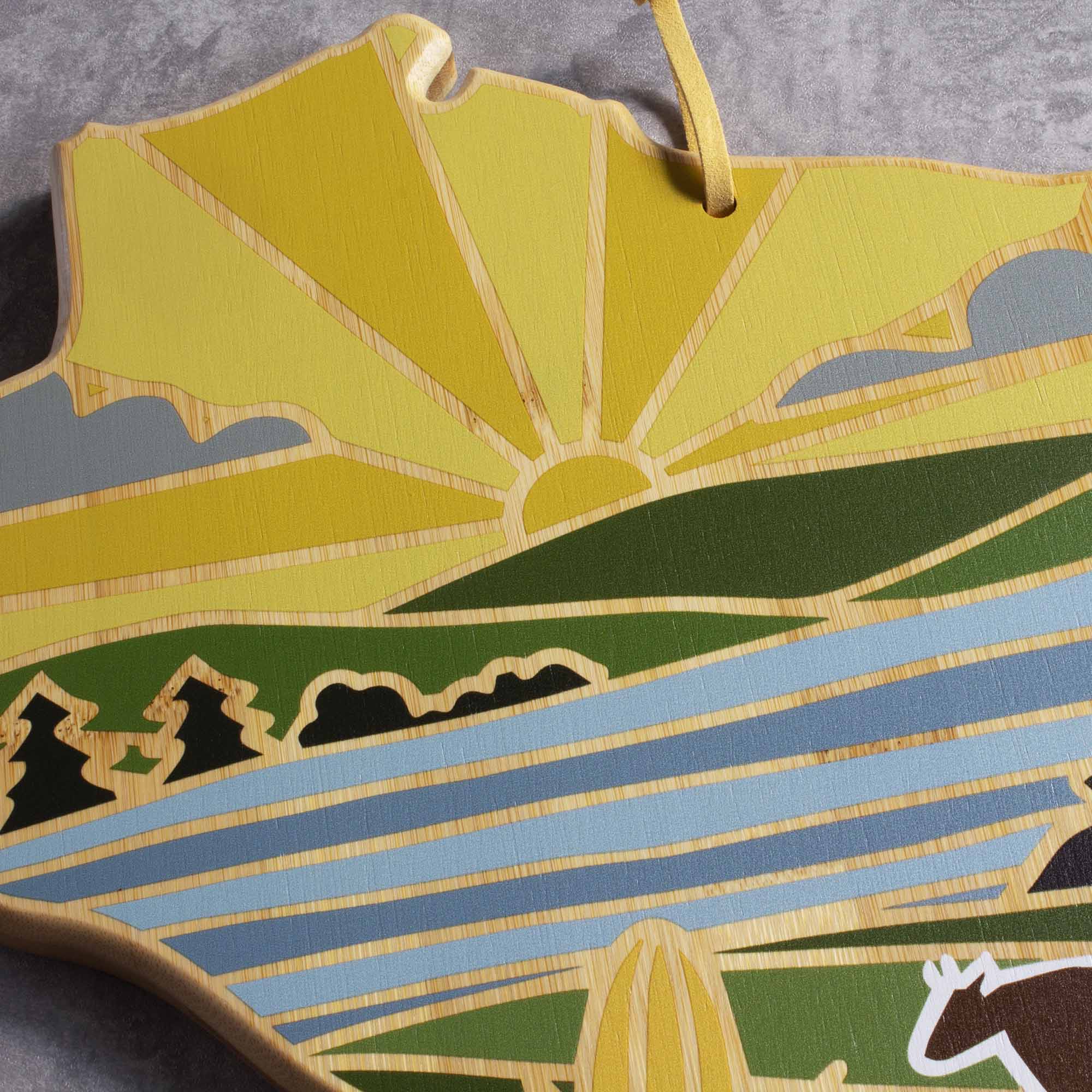 totally-bamboo-wisconsin-cutting-board-with-artwork-by-summer-stokes-state-shape image 7