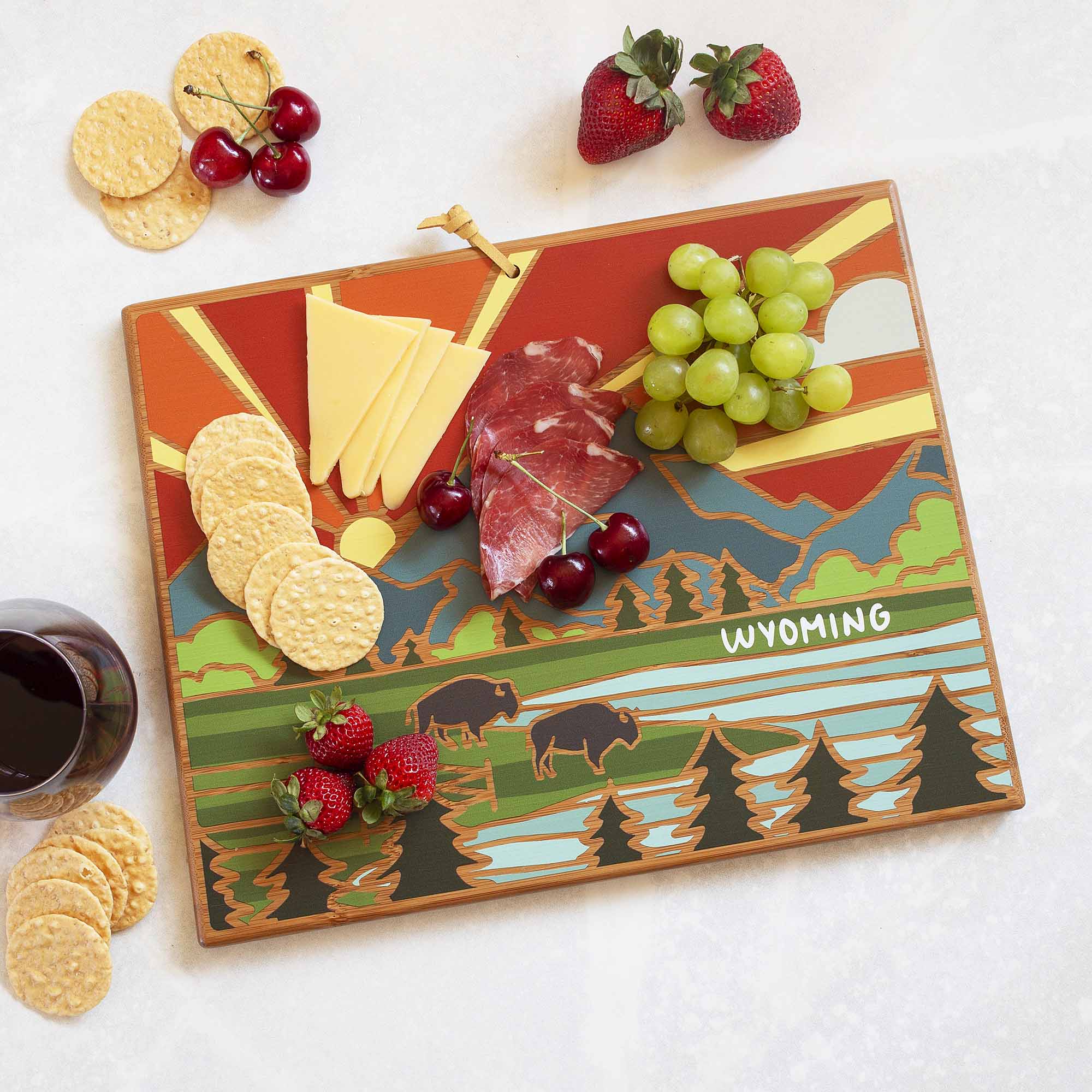 totally-bamboo-wyoming-state-shaped-cutting-board-with-summer-stokes-artwork image 2